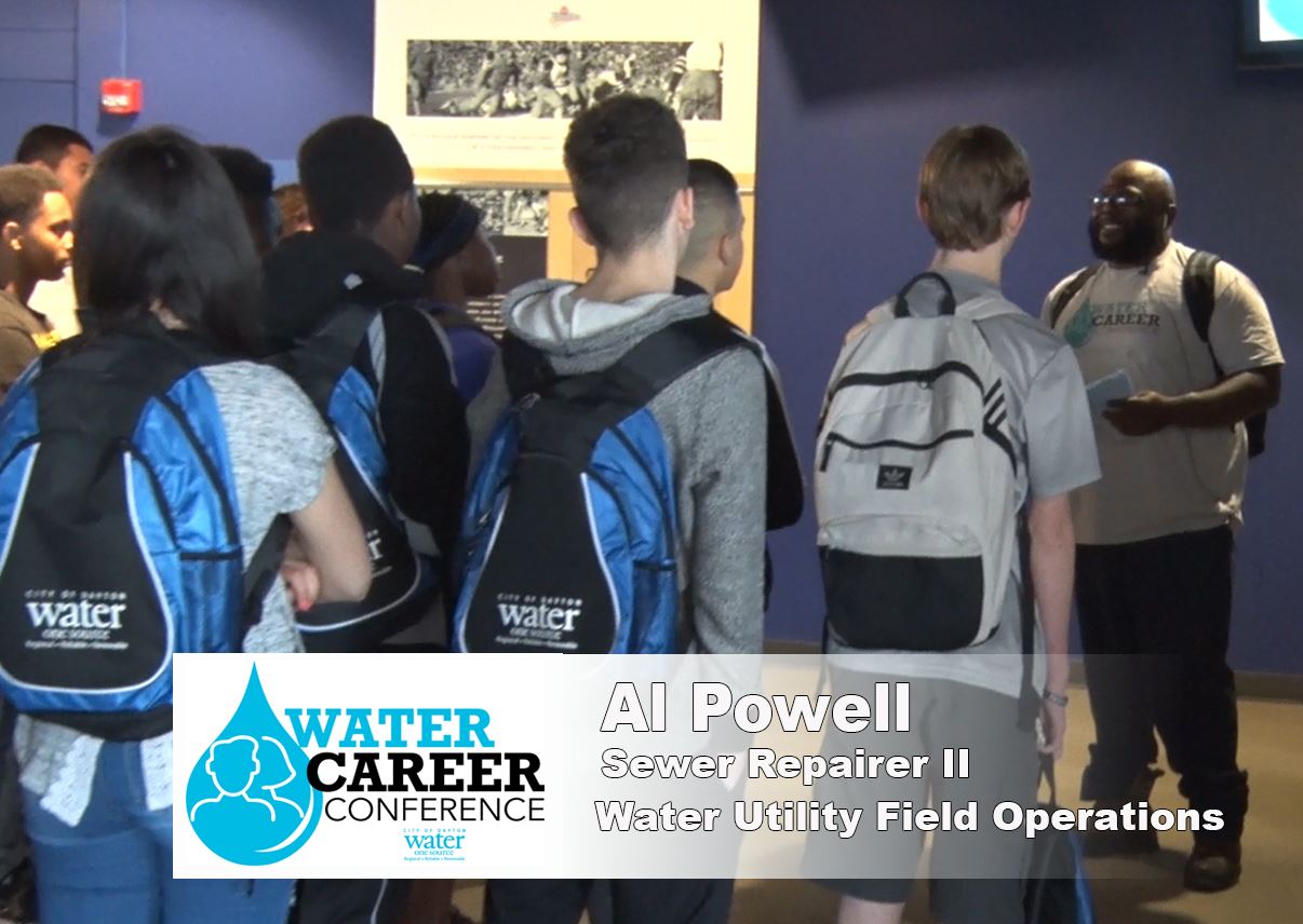 Speaker lecturing to students